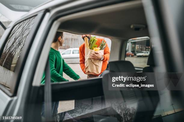 we will surprise mum with our help - plastic bread bags stock pictures, royalty-free photos & images