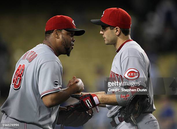 Closer Francisco Cordero of the Cincinnati Reds celebrates with first baseman Joey Votto after getting the final out and the save against the Los...