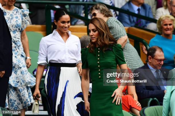 Catherine, Duchess of Cambridge and Meghan, Duchess of Sussex attend the Royal Box during Day twelve of The Championships - Wimbledon 2019 at All...