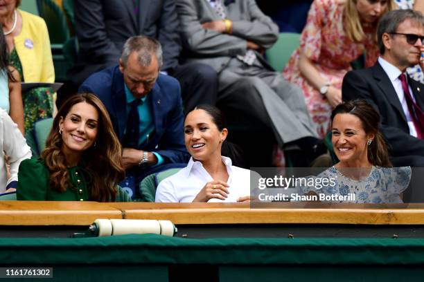Catherine, Duchess of Cambridge, Meghan, Duchess of Sussex and Pippa Middleton attend the Royal Box during Day twelve of The Championships -...