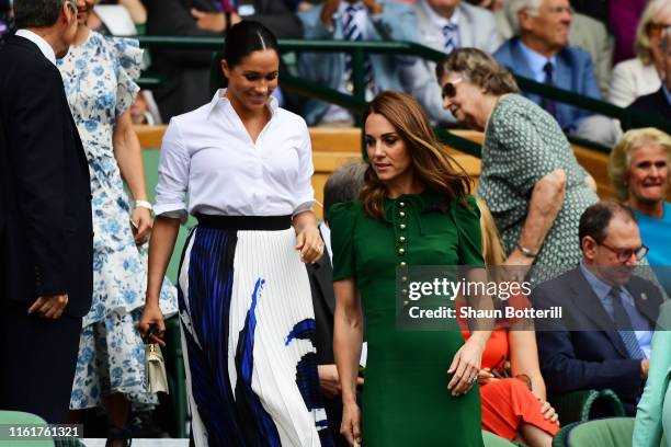 Catherine, Duchess of Cambridge and Meghan, Duchess of Sussex attend the Royal Box during Day twelve of The Championships - Wimbledon 2019 at All...