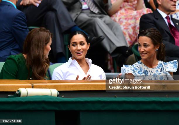 Catherine, Duchess of Cambridge, Meghan, Duchess of Sussex and Pippa Middleton attend the Royal Box during Day twelve of The Championships -...
