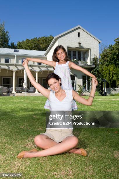 mother and daughter in garden - 2010 2019 bildbanksfoton och bilder