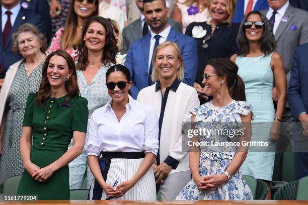 Catherine, Duchess of Cambridge, Meghan, Duchess of Sussex and Pippa Middleton react in the Royal Box after the Ladies' Singles final against during...