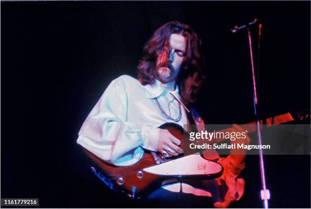 Eric Clapton with his guitar, eyes closed, long hair, both hands visible on his guitar. The Cream was indeed "the cream" of British rock musicians,...
