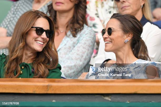 Catherine, Duchess of Cambridge and Pippa Middleton in the Royal Box on Centre Court during day twelve of the Wimbledon Tennis Championships at All...