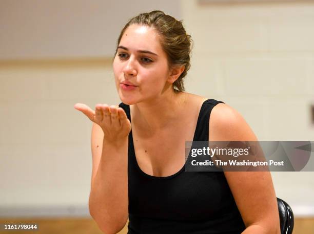 Sign language interpreter, Mandy Welly, acts out her part during a rehearsal for the musical "Dear Evan Hansen" at The Kennedy Center.