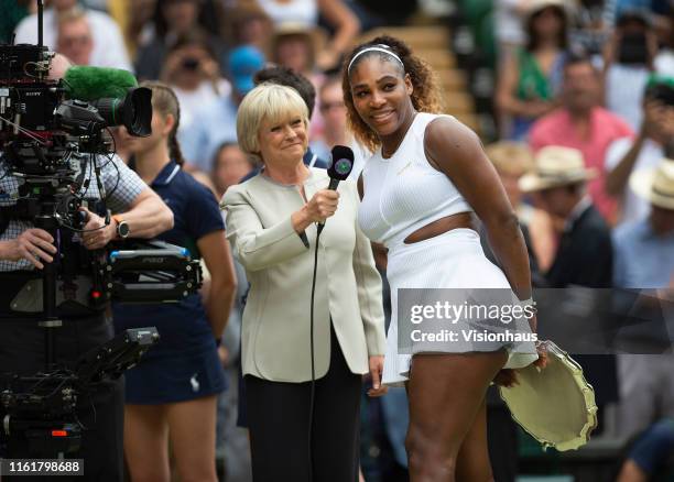 Commentator Sue Barker interviews Serena Williams of USA after her defeat to Simona Halep of Romania in the Final of the Ladies Singles on Day Twelve...