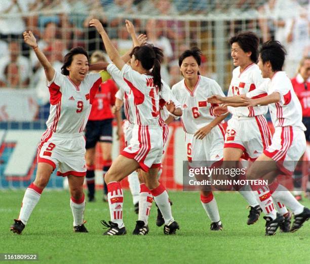 China's Sun Wen celebrates after scoring the team's first goal in the third minute of the first half of action against Norway in their 1999 Women's...