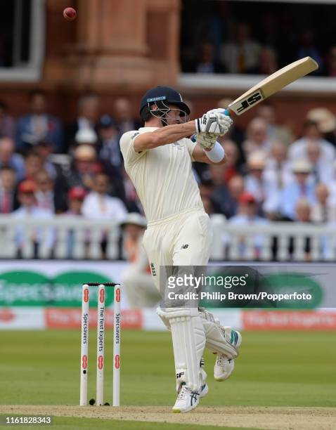 Joe Denly of England is hit on the helmet during the second day of the second Specsavers test match between England and Australia at Lord's on August...
