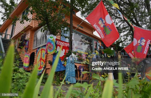 Woodstock souvenirs are on display outside at a store on Tinker Street on August 14, 2019 in Woodstock, New York. - The town of Woodstock -- a...