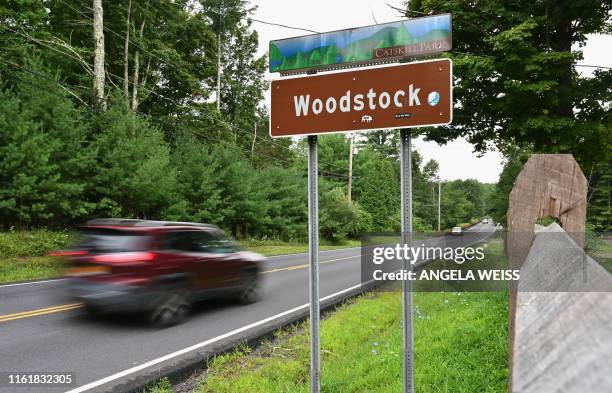 Woodstock sign is seen on August 14, 2019 in Woodstock, New York. - The town of Woodstock -- a municipality 107 miles north of New York City --...