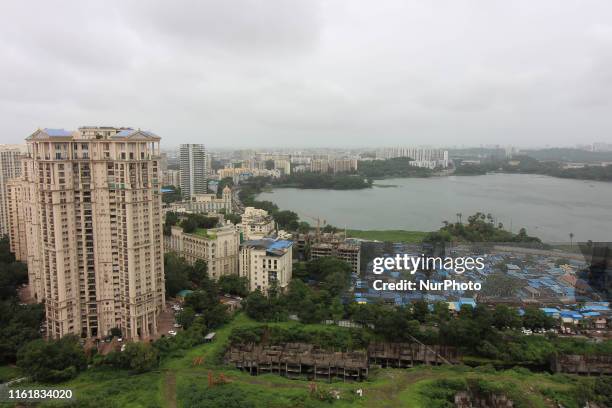 General view of residential buildings are seen along with a slum in Mumbai, India on 15 August 2019.