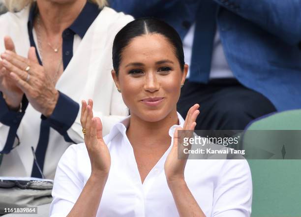Meghan, Duchess of Sussex in the Royal Box on Centre Court during day twelve of the Wimbledon Tennis Championships at All England Lawn Tennis and...
