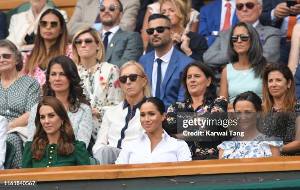 Catherine, Duchess of Cambridge, Meghan, Duchess of Sussex and Pippa Middleton in the Royal Box on Centre Court during day twelve of the Wimbledon...