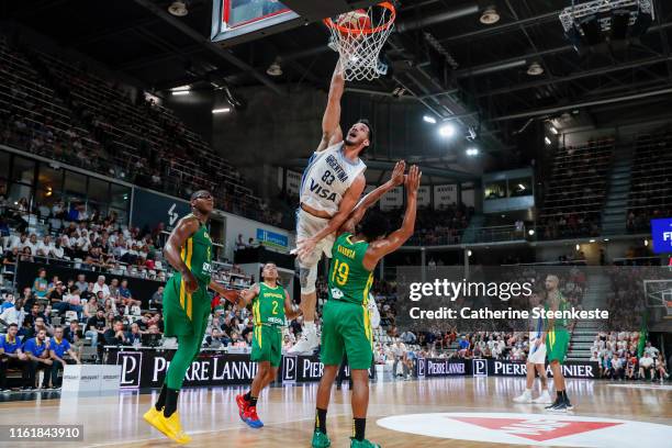 Tayavek Gallizzi of Argentina lays up against Leandro Barbosa of Brazil during the International Friendly match between Argentina and Brazil at The...