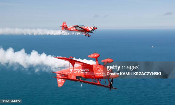 Team Oracle, Hall of Fame Air Show Performer Sean D. Tucker and Jessy Panzer fly their aircrafts over Chicago as they prepare for the 61th annual...