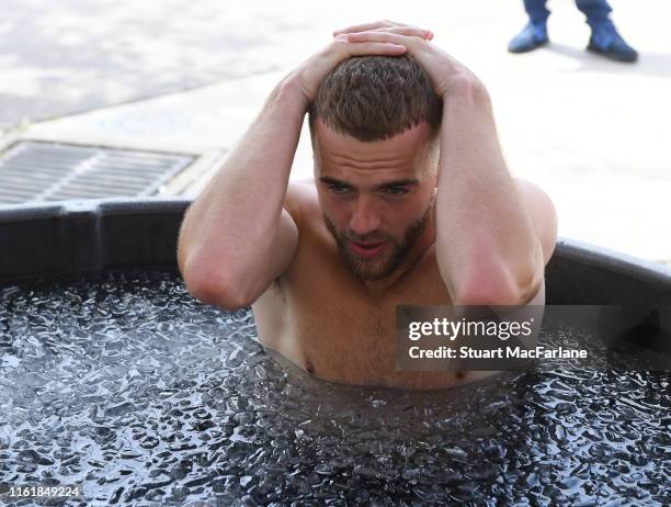 Arsenal's Calum Chambers takes an ice bath after a training session at the Loyola Marymount University on July 13, 2019 in Los Angeles, California.