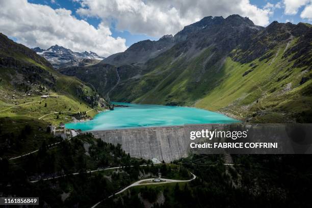 This picture taken on Augut 15, 2019 shows an aerial view of the Cleuson dam above Haute-Nendaz, southern Switzerland. - The water from the Clauson...