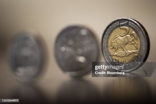 South African five rand coin stands in this arranged photograph in Pretoria, South Africa, on Wednesday, Aug. 14, 2019. The rand ended a tumultuous...