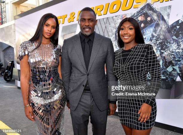 Sabrina Dhowre Elba, Idris Elba, and Isan Elba arrive at the premiere of Universal Pictures' "Fast & Furious Presents: Hobbs & Shaw" at Dolby Theatre...