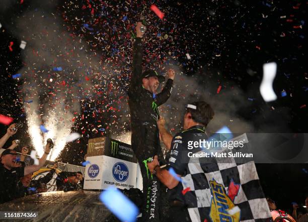 Kurt Busch, driver of the Monster Energy Chevrolet, celebrates in Victory Lane after winning the Monster Energy NASCAR Cup Series Quaker State 400...