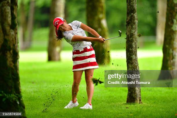 Yui Kawamoto of Japan hits her second shot on the 7th hole during the final round of the Nippon Ham Ladies Classic at Katsura Golf Club on July 14,...