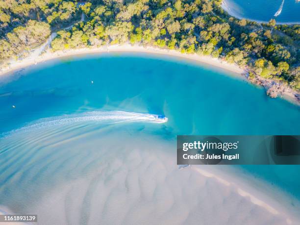 aerial view of noosa river with boat passing through - sunshine coast australia stock pictures, royalty-free photos & images