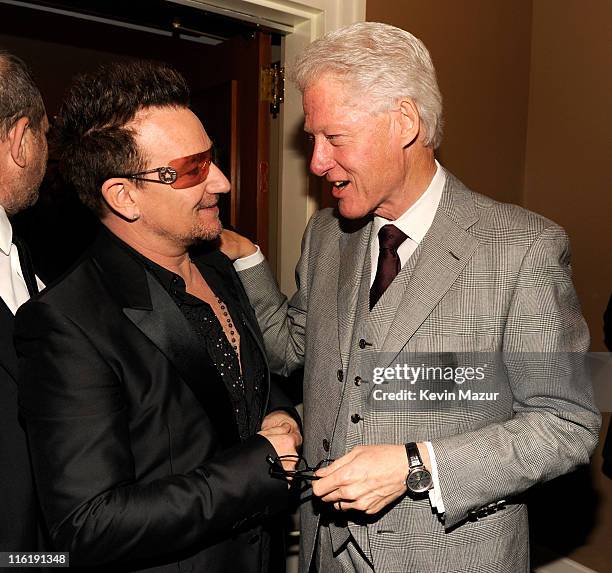 Bono of U2 and President Bill Clinton backstage at "Spider-Man Turn Off The Dark" Broadway opening night at Foxwoods Theatre on June 14, 2011 in New...