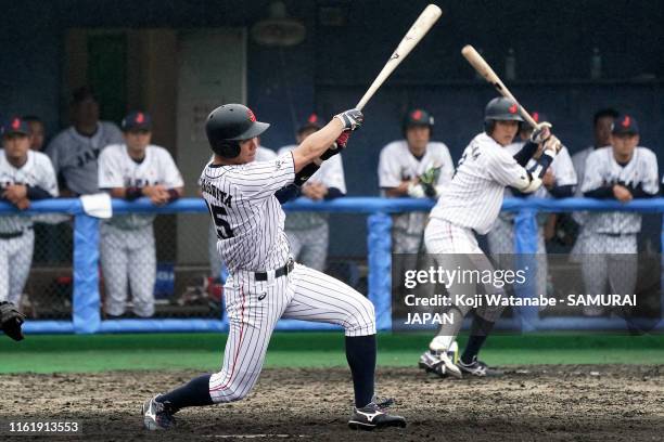 Shota Morishita of SAMURAI JAPAN hits a homer in the bottom half of the ninth innings, during the practice match between Collegiate Japan and...