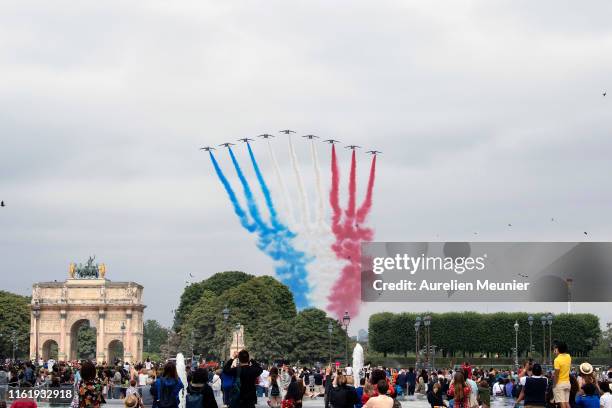 Patrouille de France jets fly over the Tuileries Garden during the Bastille day ceremony on July 14, 2019 in Paris, France. The Bastille Day Military...