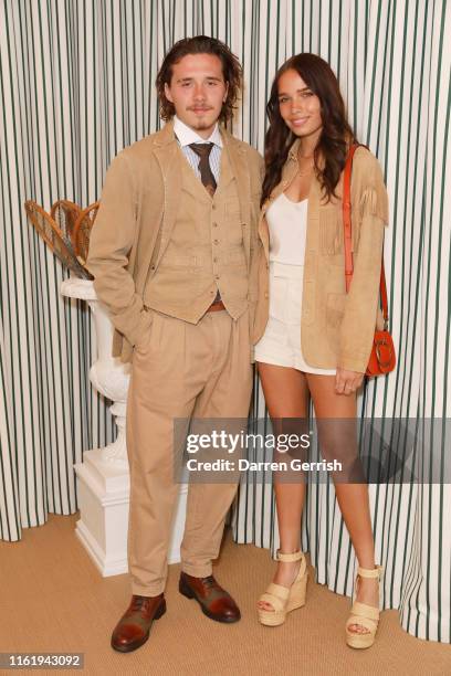 Hana Cross and Brooklyn Beckham in Polo Ralph Lauren attend the Polo Ralph Lauren suite during the Wimbledon Tennis Championship Men's Final at All...