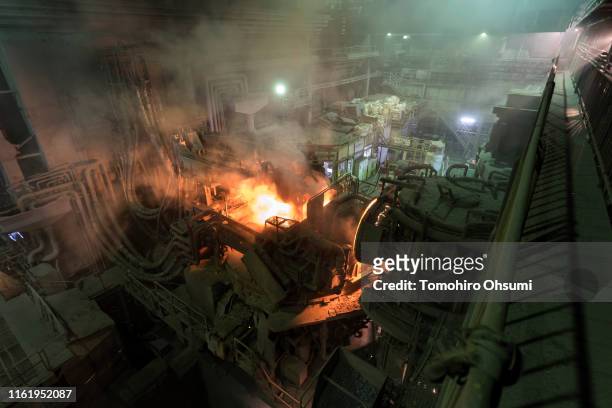 Steam rises from an electric arc furnace at the Jonan Steel Corp. Factory on July 14, 2019 in Kawaguchi, Japan. The ferrum recycling company located...