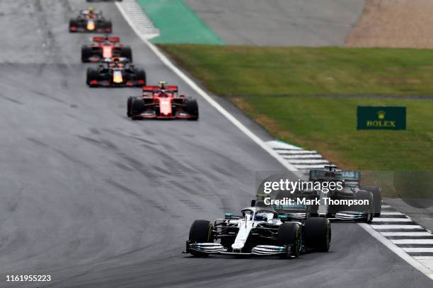 Valtteri Bottas driving the Mercedes AMG Petronas F1 Team Mercedes W10 leads Lewis Hamilton of Great Britain driving the Mercedes AMG Petronas F1...