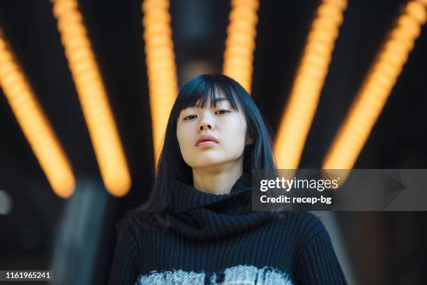 portrait of young confident woman - in the center stock pictures, royalty-free photos & images