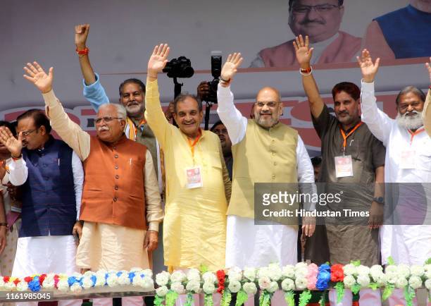Home Minister Amit Shah , Haryana Chief Minister Manohar Lal Khattar , BJP MP Birender Singh , Health Minister Anil Vij , and Haryana BJP President...