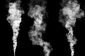 set of three steam or smoke plumes on black