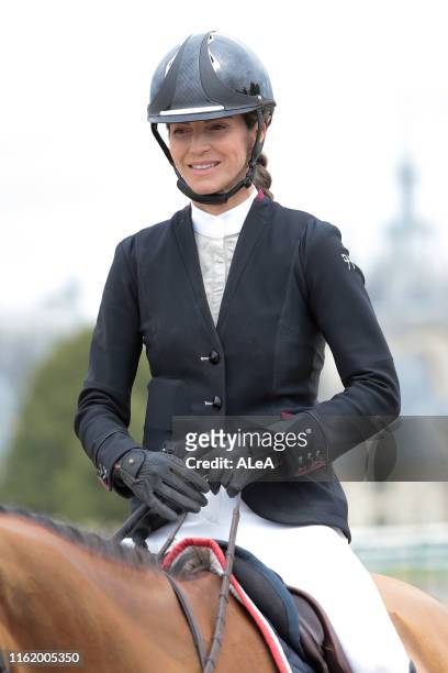French rider and writer Felicite Herzog, daughter of late alpinist Maurice Herzog, competes in the RENAULT RENT jumping competition against the clock...