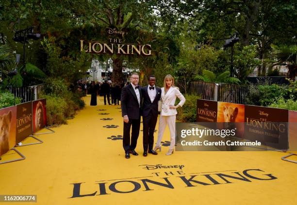 Guy Ritchie, David Banda Mwale Ciccone Ritchie and Jacqui Ainsley attend the European Premiere of Disney's "The Lion King" at Odeon Luxe Leicester...