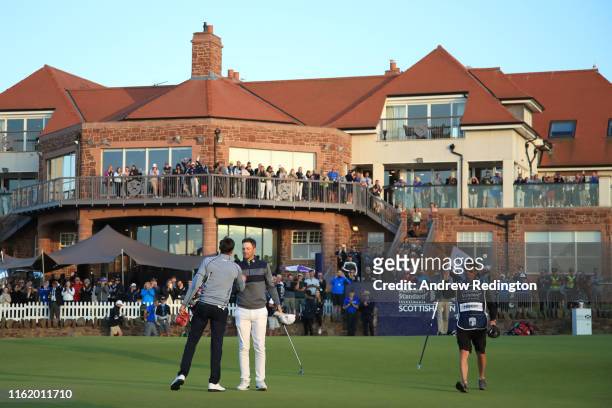Bernd Wiesberger of Austria shakes hands with Benjamin Hebert of France following the final round of the Aberdeen Standard Investments Scottish Open...