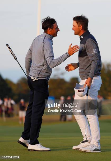 Bernd Wiesberger of Austria shakes hands with Benjamin Hebert of France following the final round of the Aberdeen Standard Investments Scottish Open...