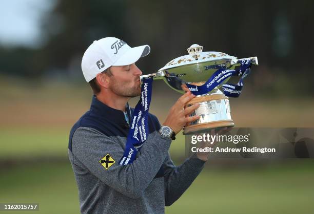 Bernd Wiesberger of Austria celebrates with the trophy following victory in the final round of the Aberdeen Standard Investments Scottish Open at The...