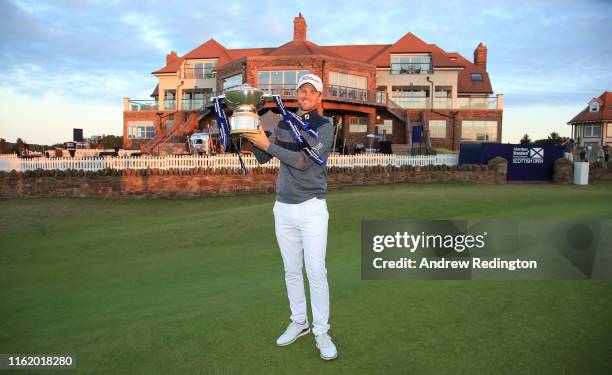 Bernd Wiesberger of Austria celebrates with the trophy following victory in the Aberdeen Standard Investments Scottish Open at The Renaissance Club...