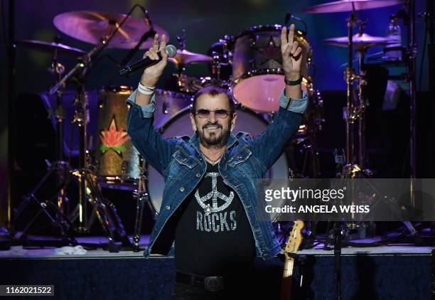 English musician Ringo Starr performs onstage at the 50th anniversary celebration of Woodstock at Bethel Woods Center for the Arts on August 15, 2019...