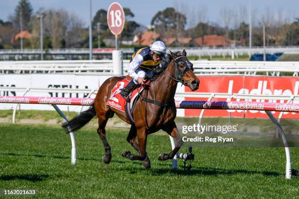 Benitoite ridden by Damien Oliver wins the Black Caviar Tribute Handicap at Caulfield Racecourse on August 17, 2019 in Caulfield, Australia.