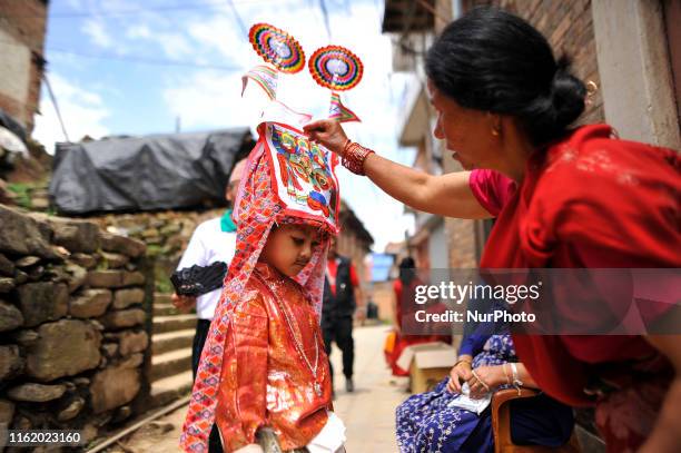 Kid impersonate as cow welcomes during Gai Jatra or Cow Festival celebrated in Kirtipur, Kathmandu, Nepal on Friday, August 16, 2019. On the occasion...