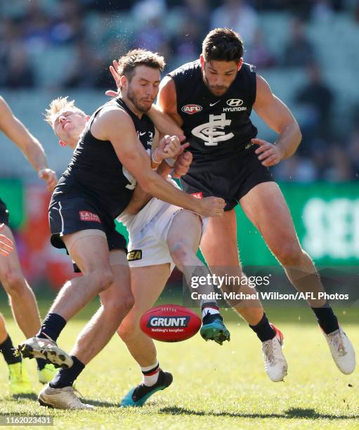 Dale Thomas of the Blues and Levi Casboult of the Blues collide during the 2019 AFL round 22 match between the Carlton Blues and the St Kilda Saints...