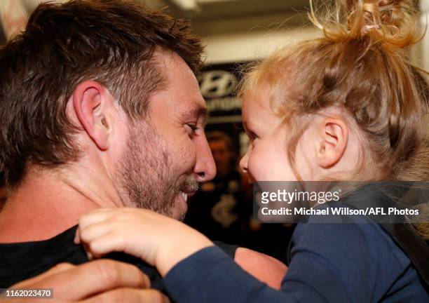 Dale Thomas of the Blues and daughter Matilda celebrate during the 2019 AFL round 22 match between the Carlton Blues and the St Kilda Saints at the...