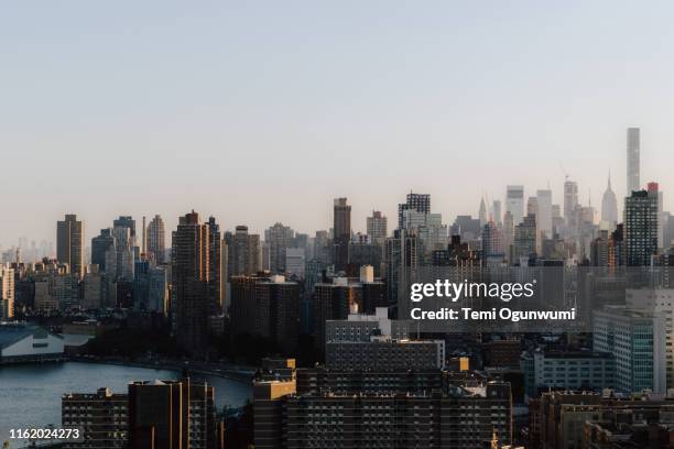 new york city sunset - the bronx stock-fotos und bilder