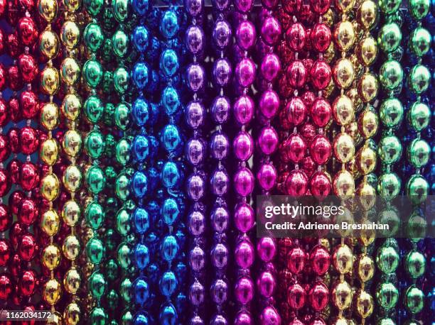 party beads - mardi gras flashing stock pictures, royalty-free photos & images